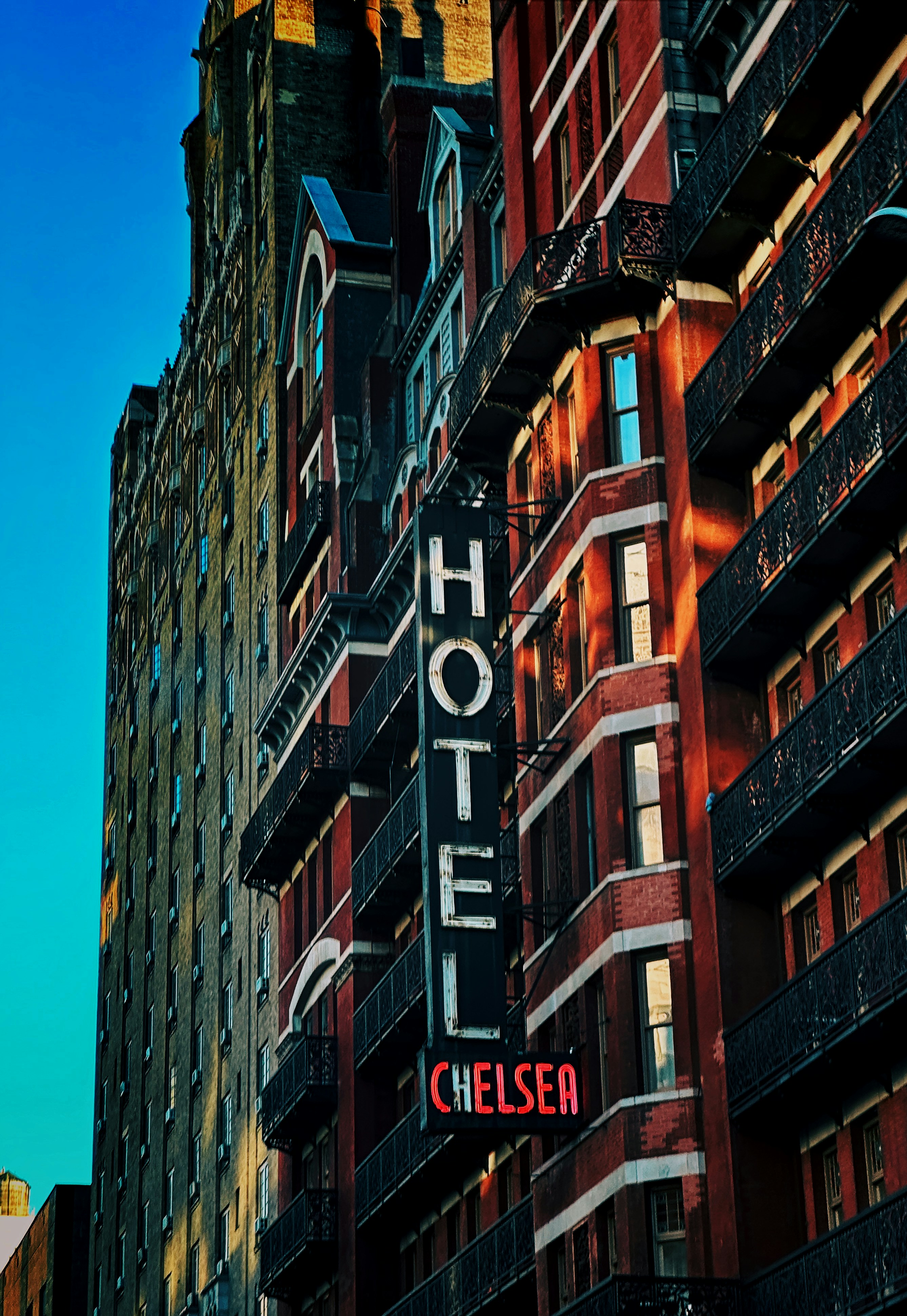 a large hotel sign on the side of a building