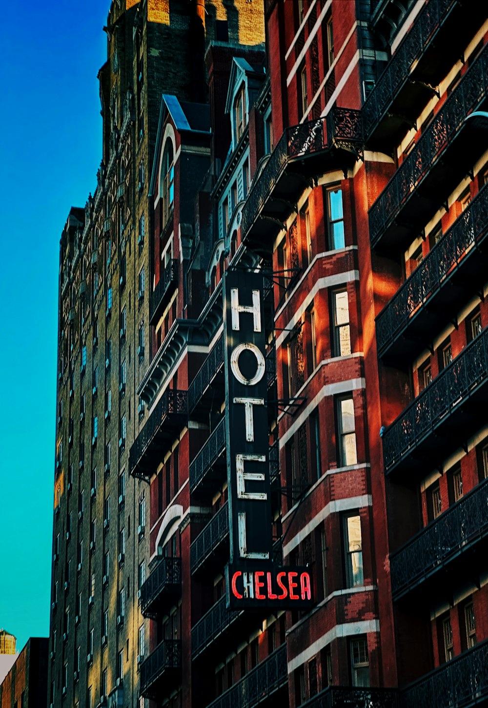 a large hotel sign on the side of a building