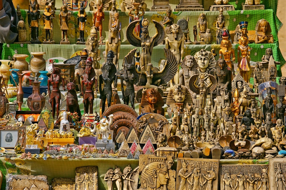 a large assortment of figurines on display in a store