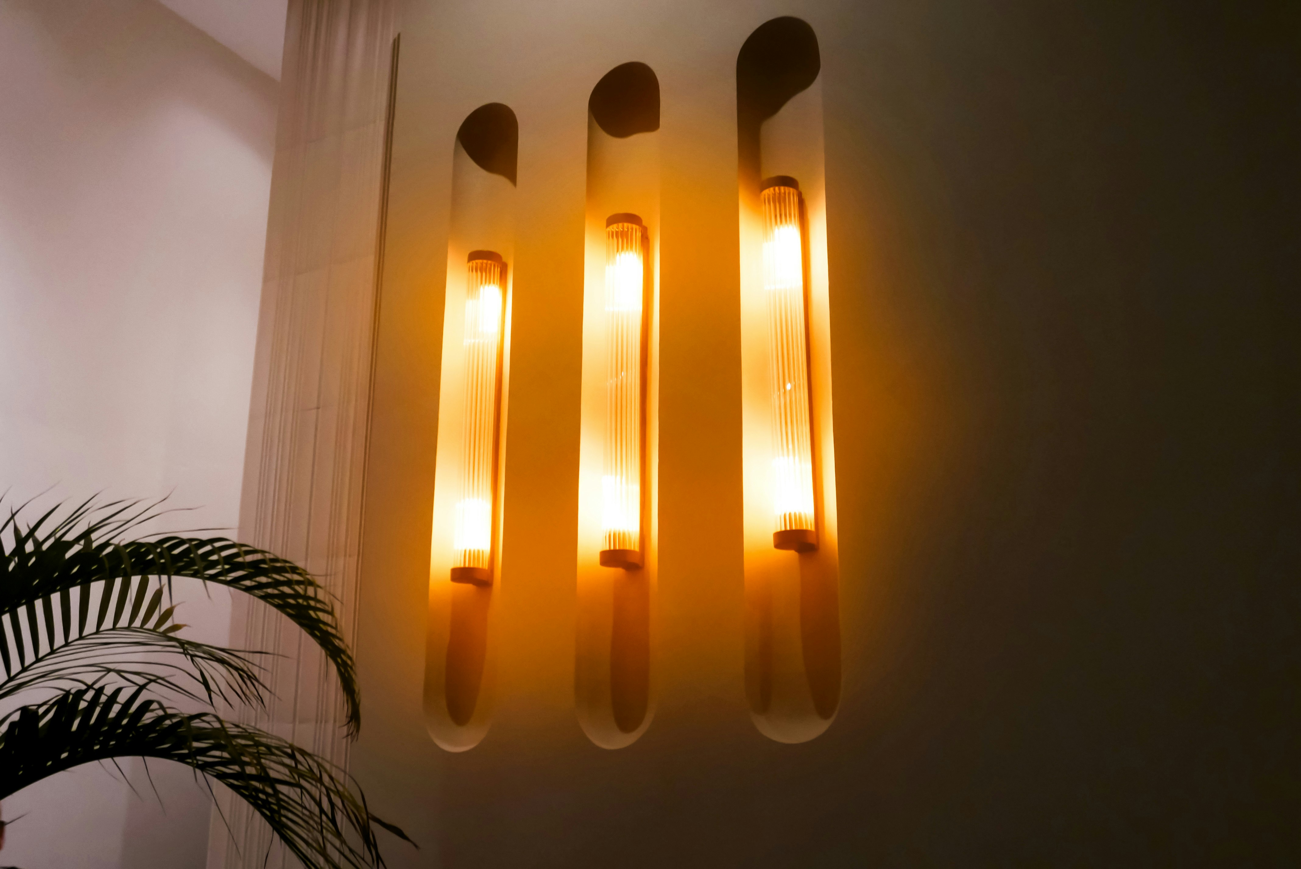 a couple of lights that are on a wall