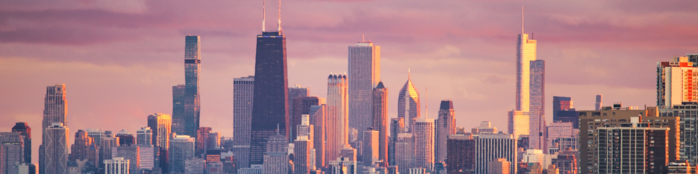 a view of a large city with tall buildings