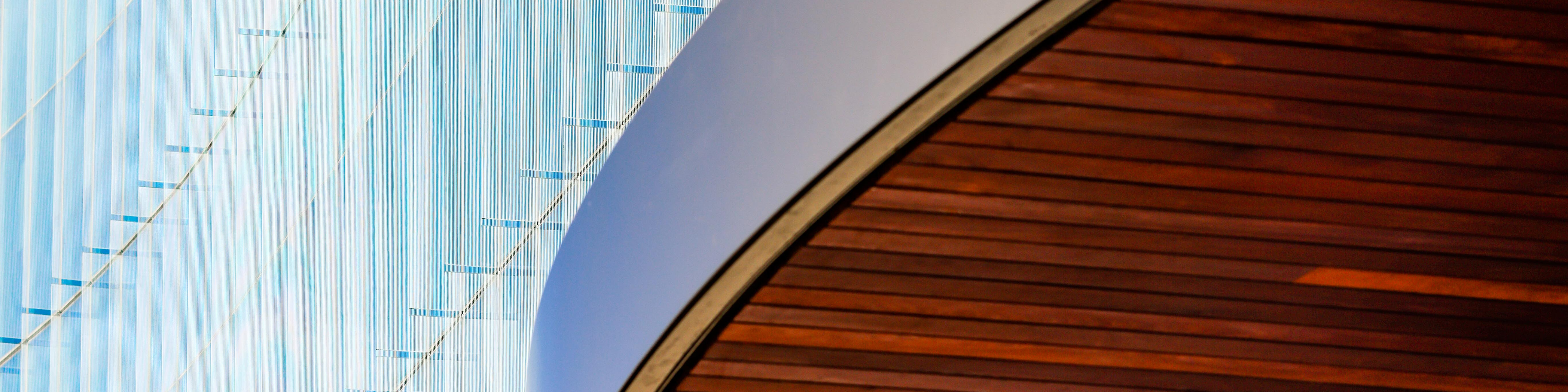 a man holding a tennis racquet on top of a tennis court, 