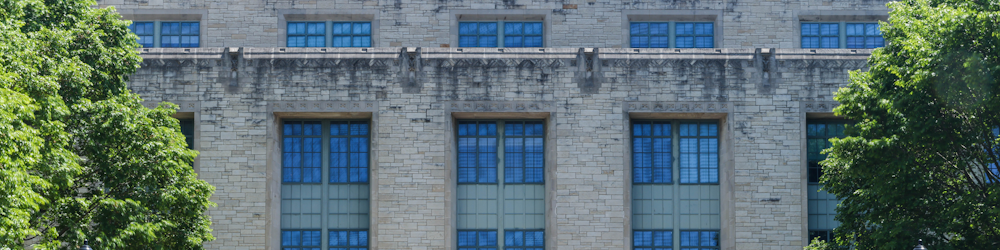 a building with a clock on the front of it