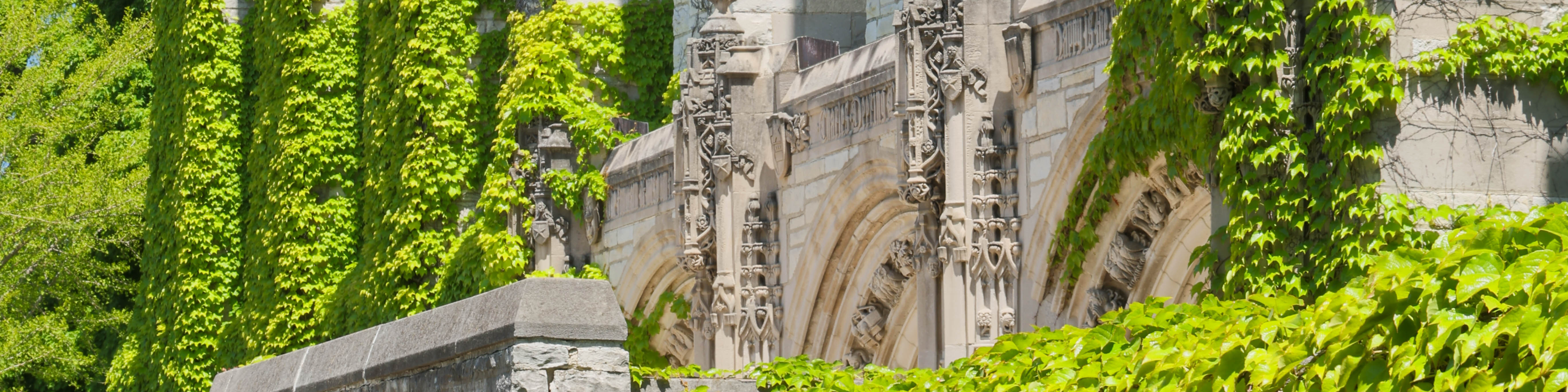 a very tall building with a clock on it's side