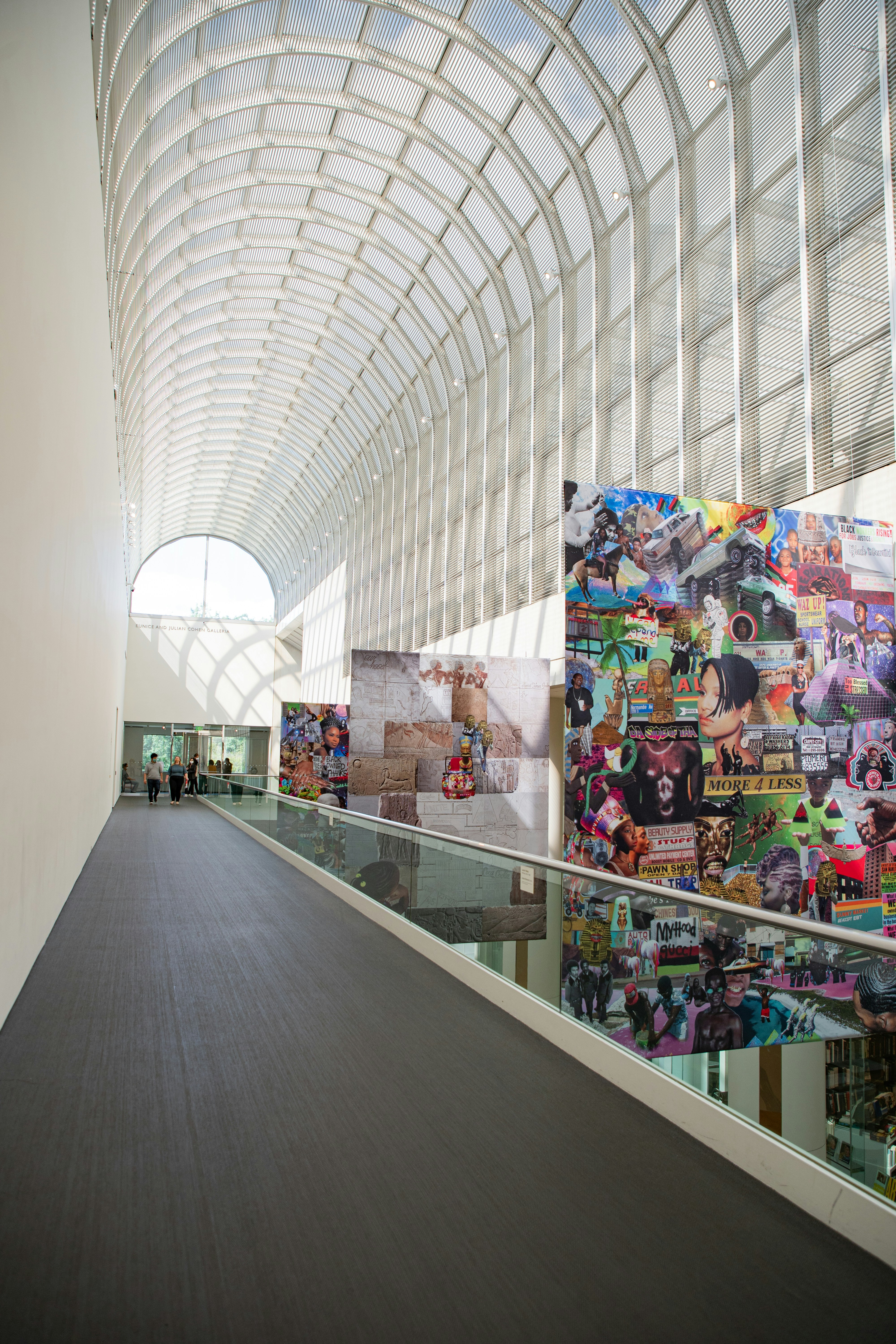 a person riding a skateboard down a ramp in a building