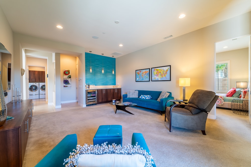 a living room filled with furniture and a flat screen tv