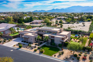 an aerial view of a home in the desert