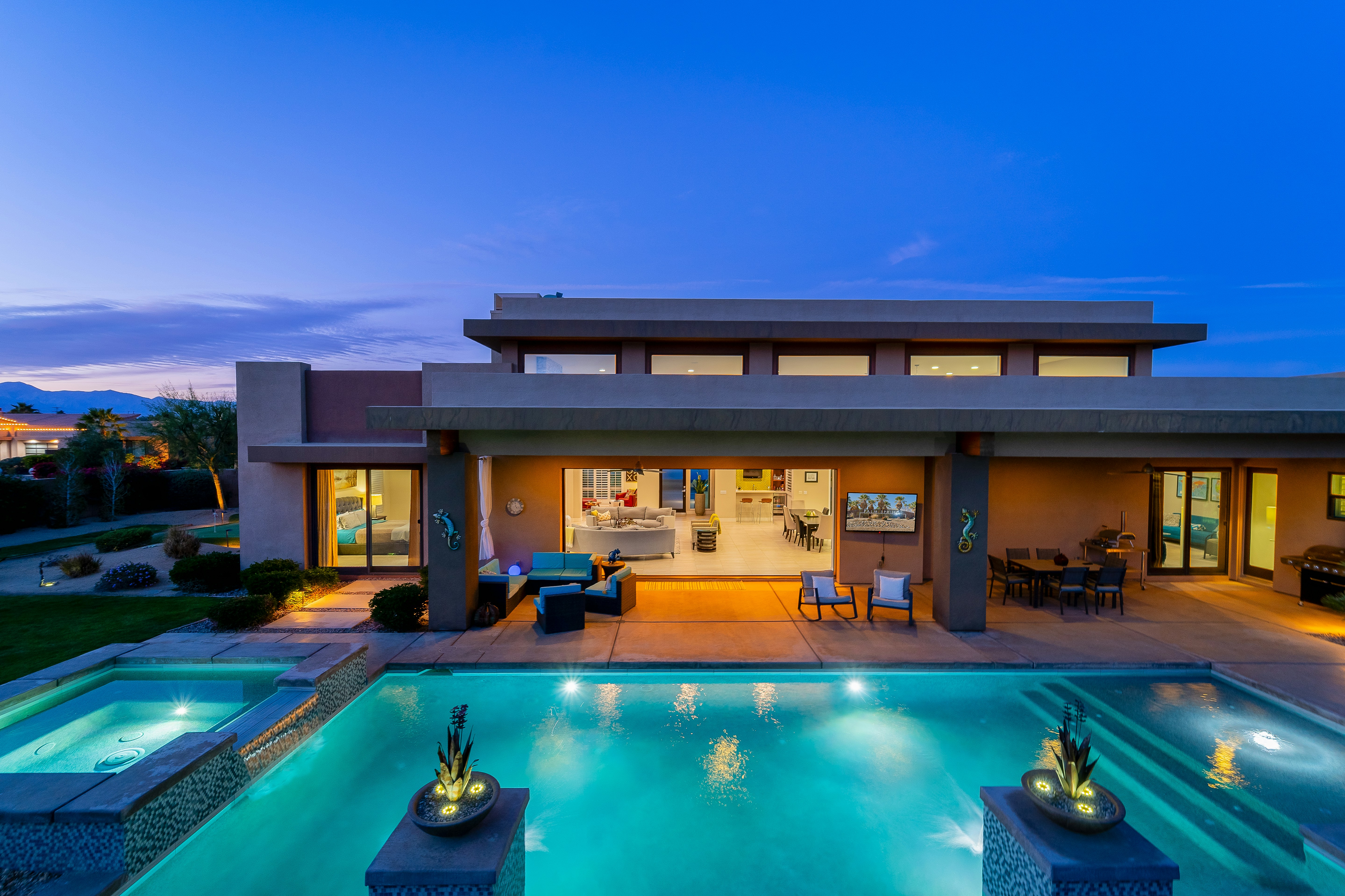 Beautiful modern home with warm lighting showcasing diverse family lifestyle