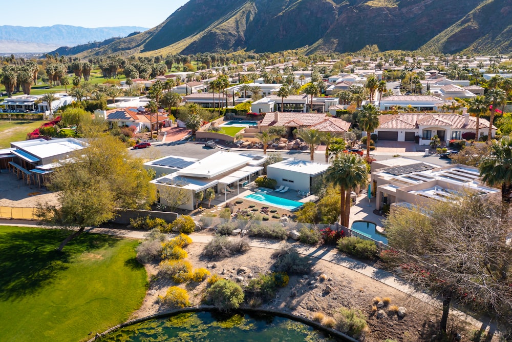 a bird's eye view of a home surrounded by mountains