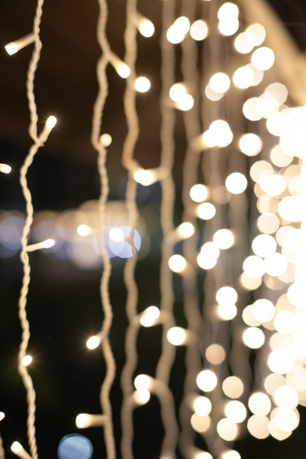 a string of lights hanging from a ceiling