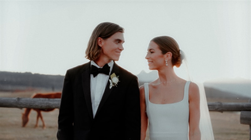 a man and a woman standing next to each other