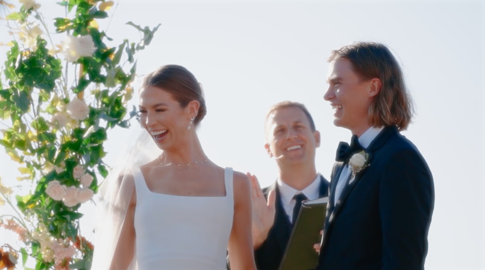 a man and a woman standing next to each other