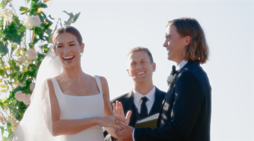 a man and a woman standing next to each other