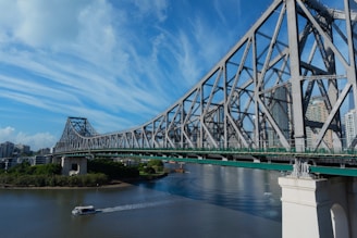 a large bridge spanning over a large body of water