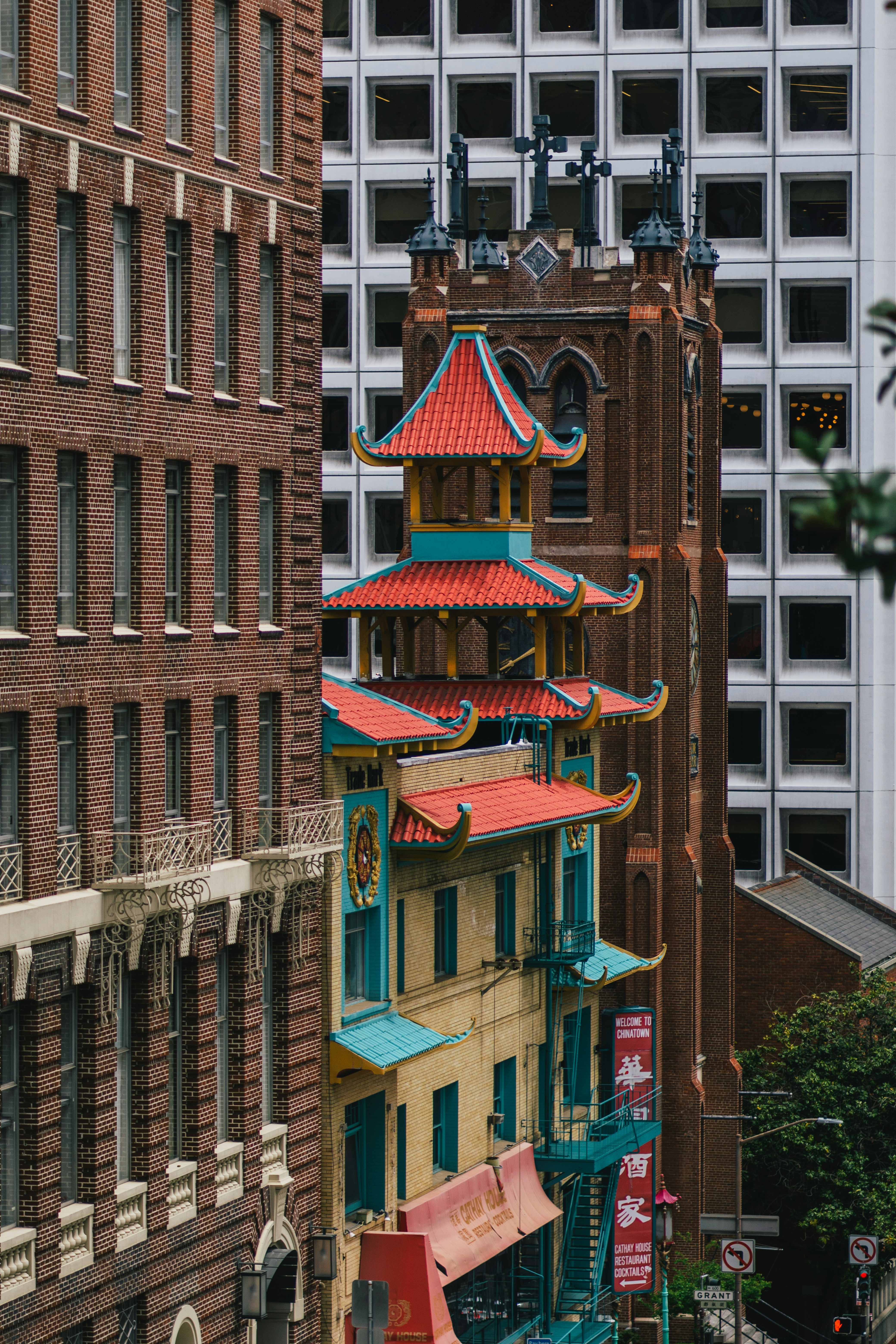 a clock tower in the middle of a city