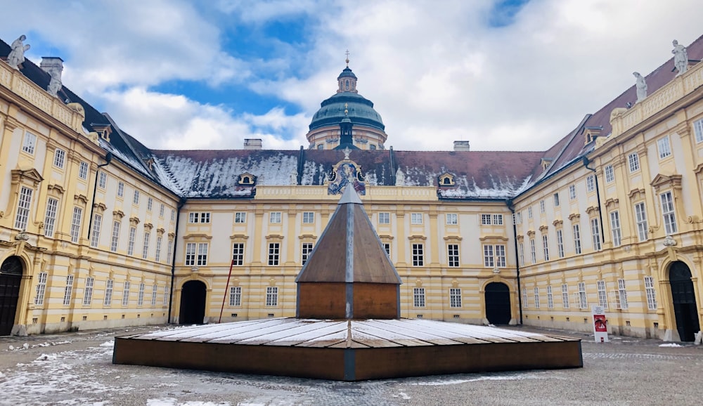 a large building with a clock tower in the middle of it