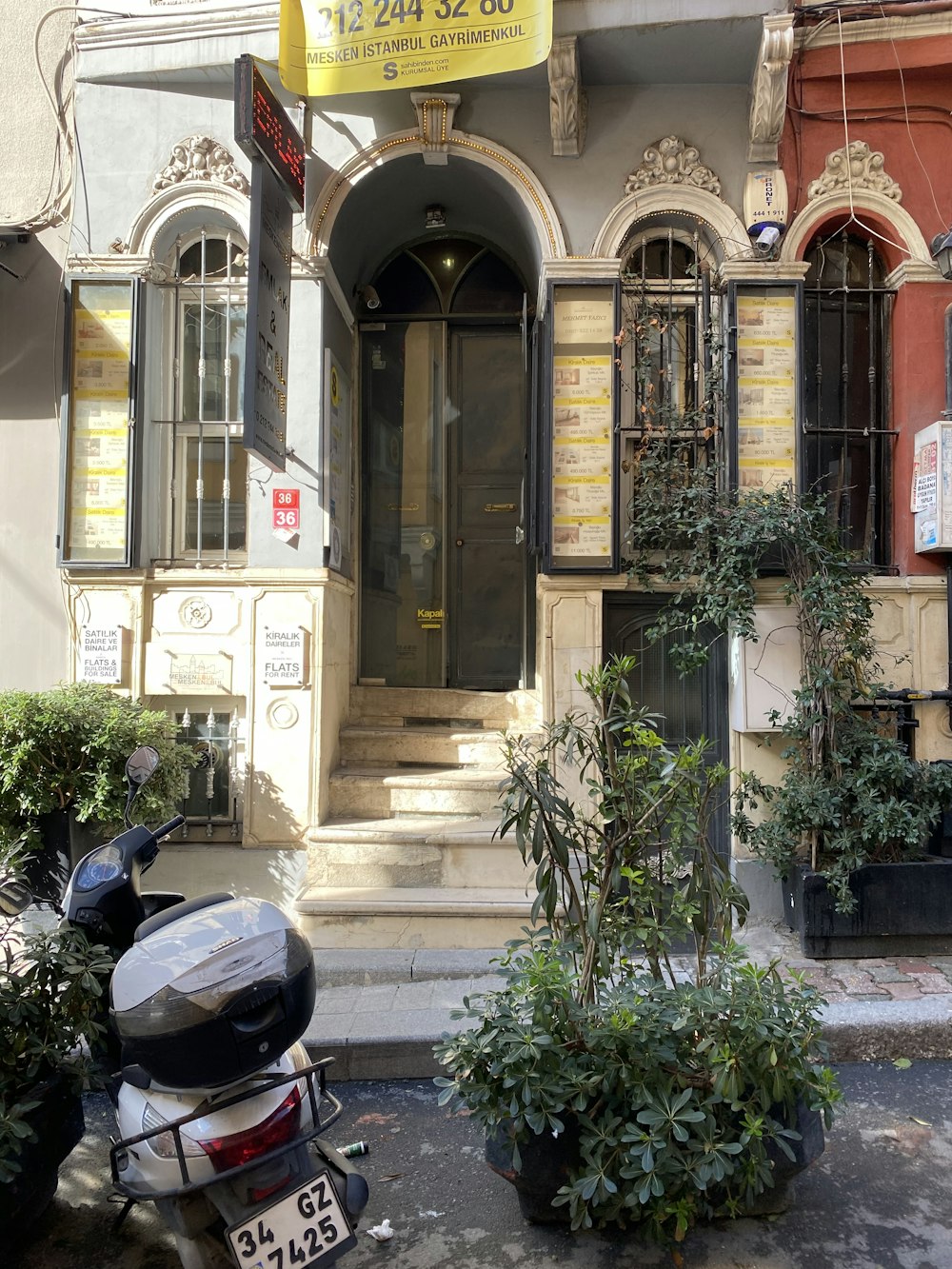 a motorcycle parked in front of a building