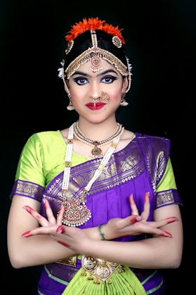 a woman in a purple and green outfit
