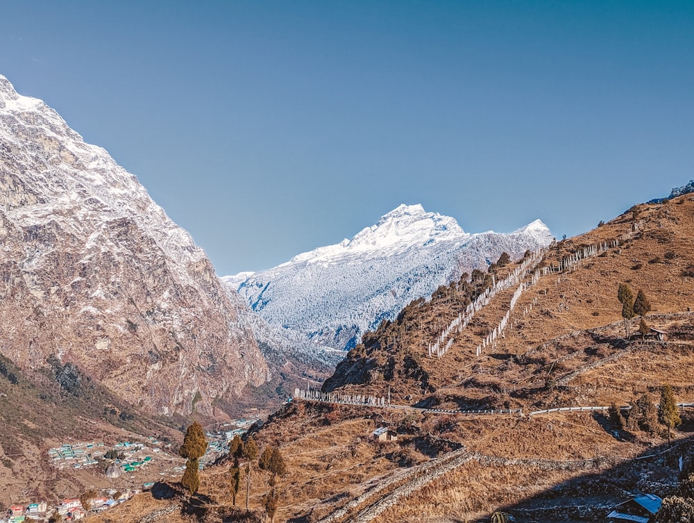 a view of a snow covered mountain from a distance