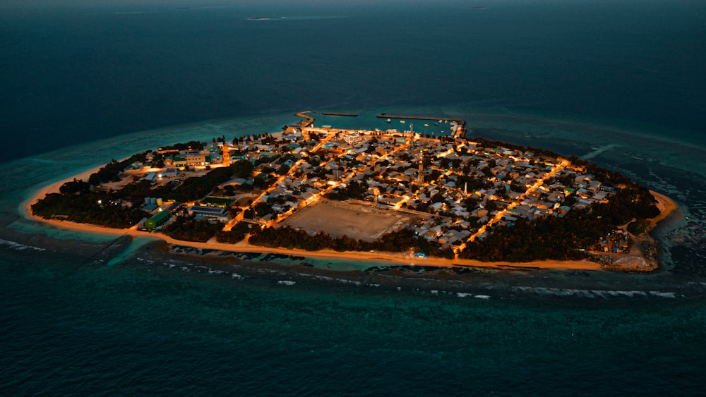 an aerial view of a small island in the middle of the ocean