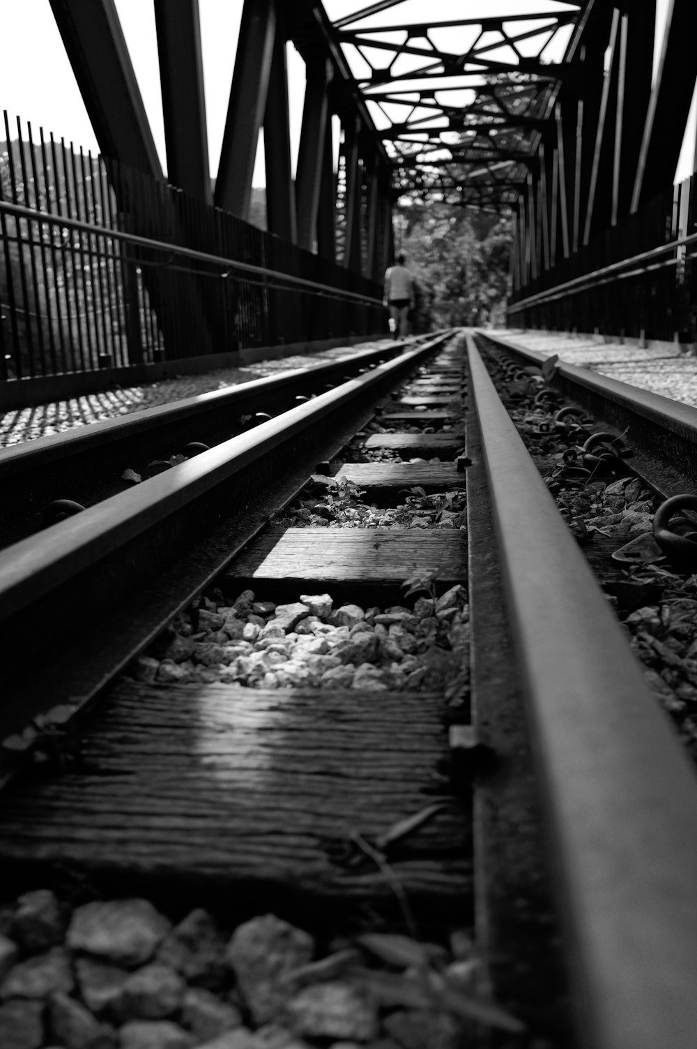 a black and white photo of a train track