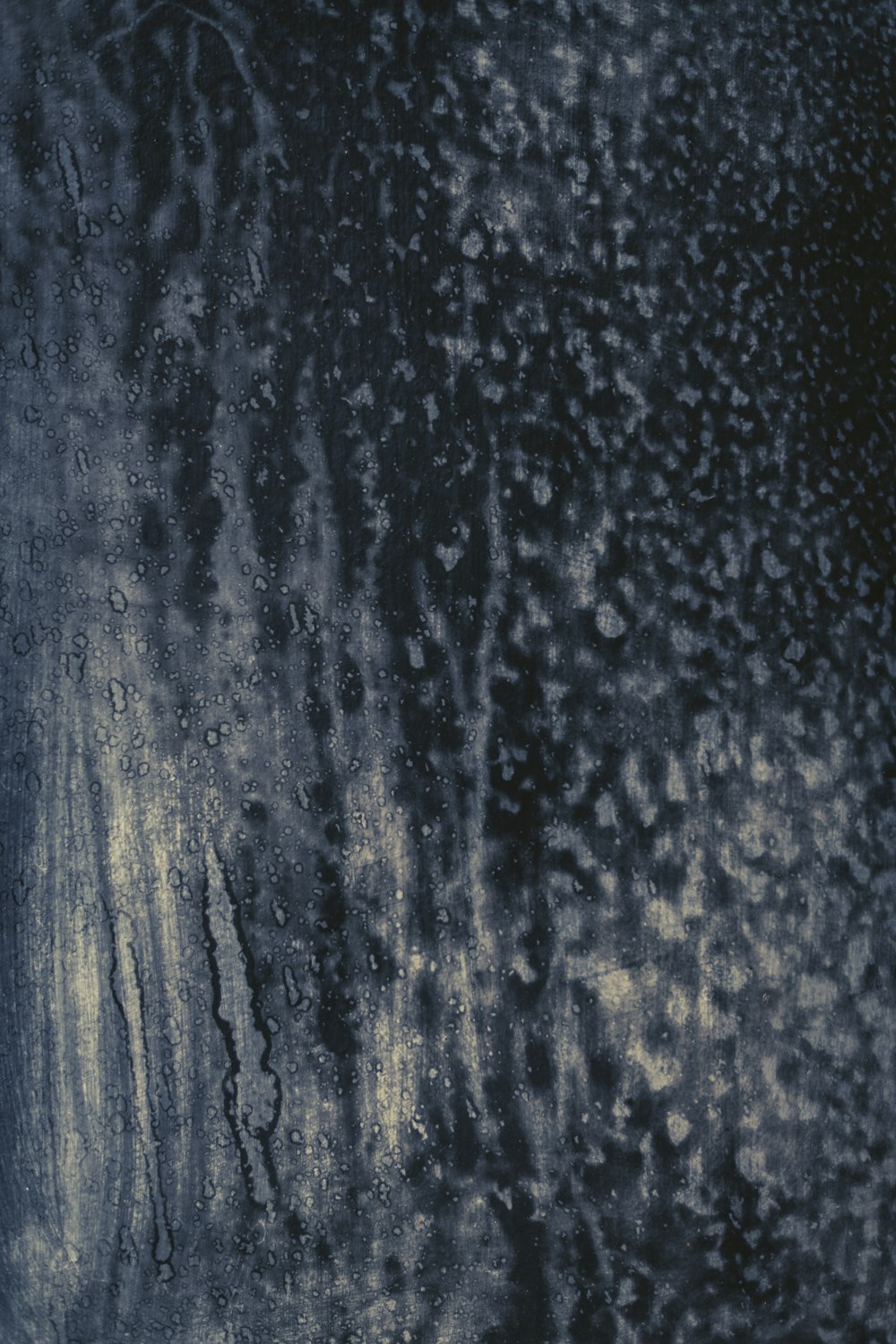 a close up of water droplets on a window