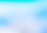 a blurry image of a blue and white background