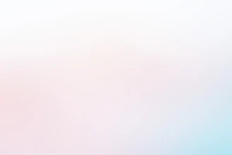 a blurry photo of a pink and blue background