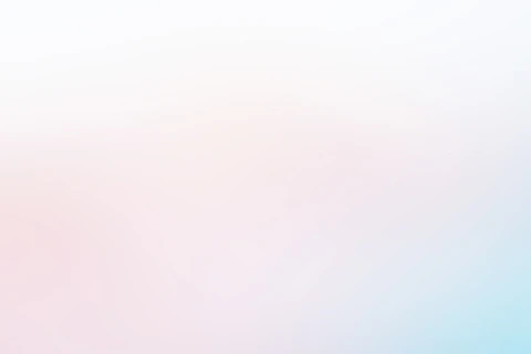 a blurry photo of a pink and blue background