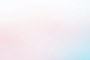 a blurry photo of a pink and blue background