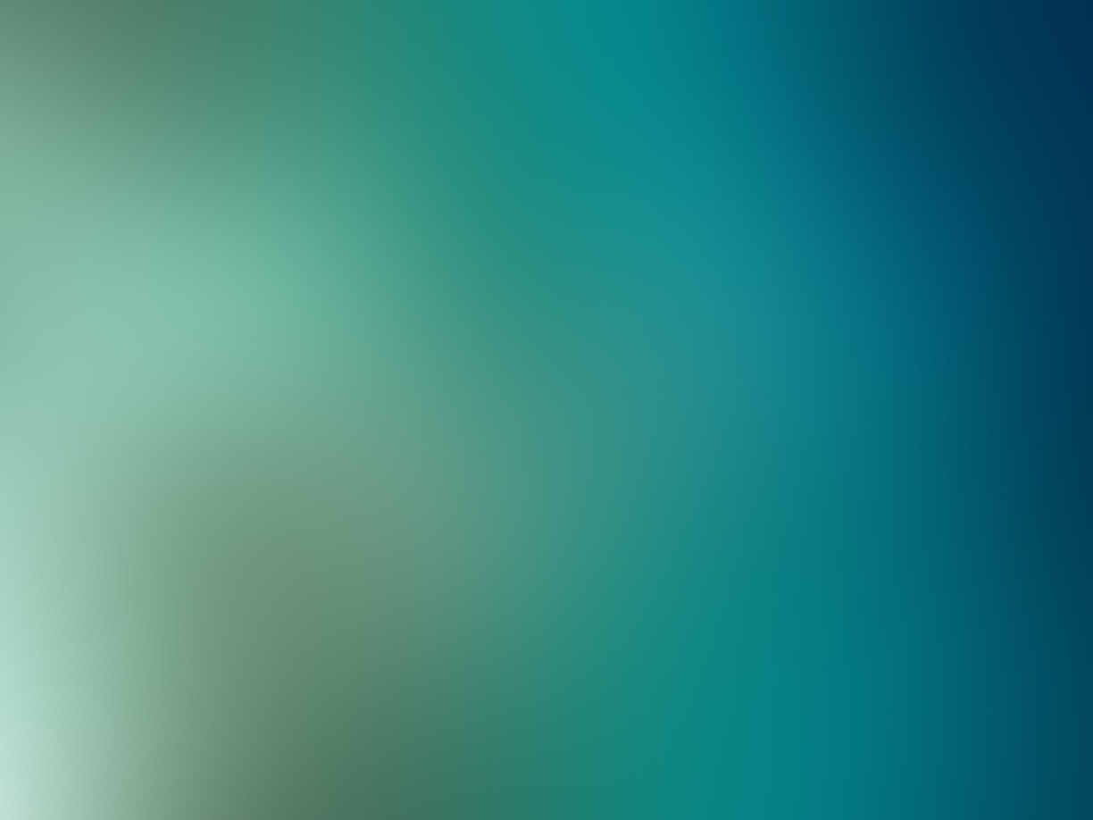 a blurry image of a blue and green background