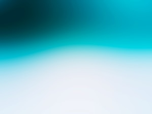 a blurry image of a blue and white background