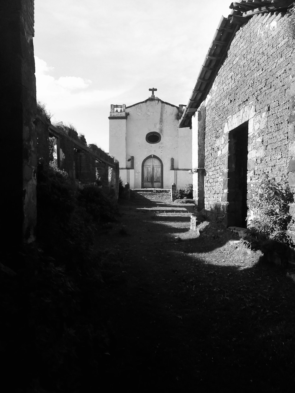 a black and white photo of a church