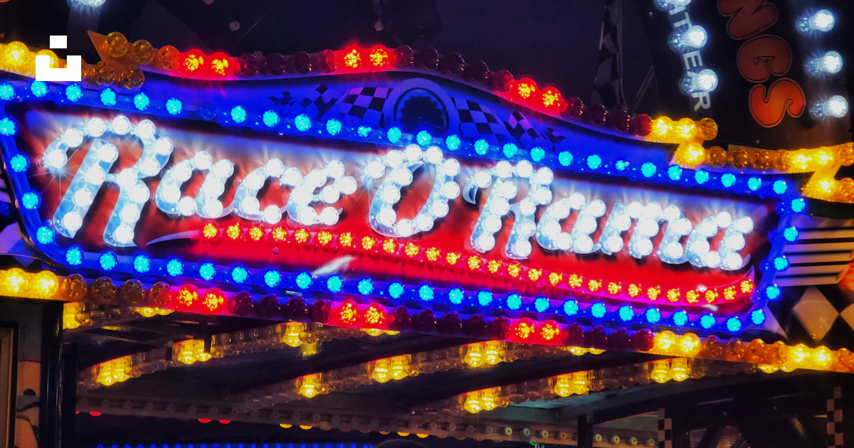 Cool Rides Sign A carnival ride sign lit up at night photo – Free Hyde park Image on ...