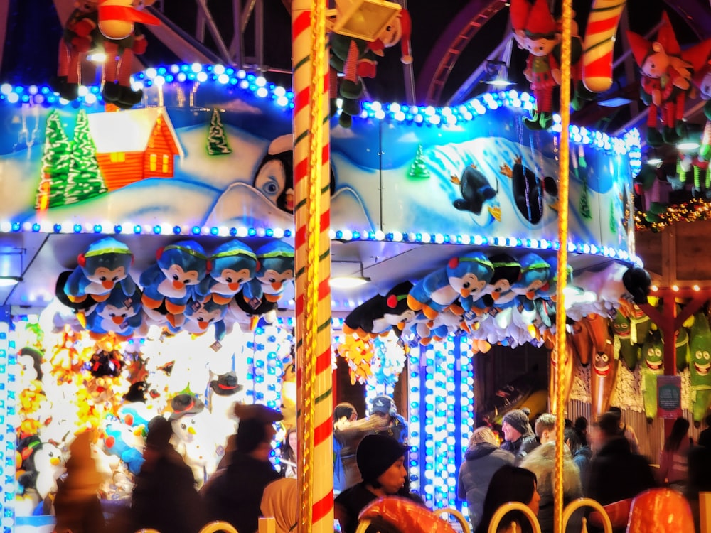 a merry go round at night with people on it