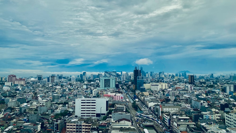 a view of a city from the top of a building