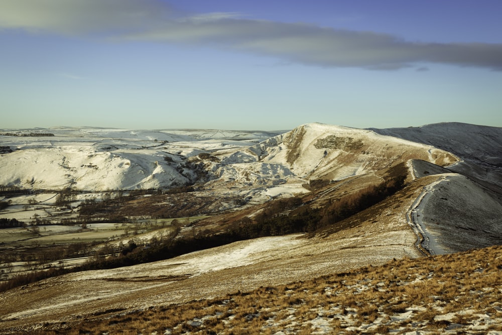 a view of a snow covered mountain range