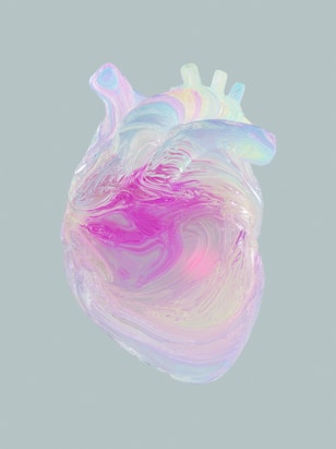 a heart shaped object with a pink and blue swirl