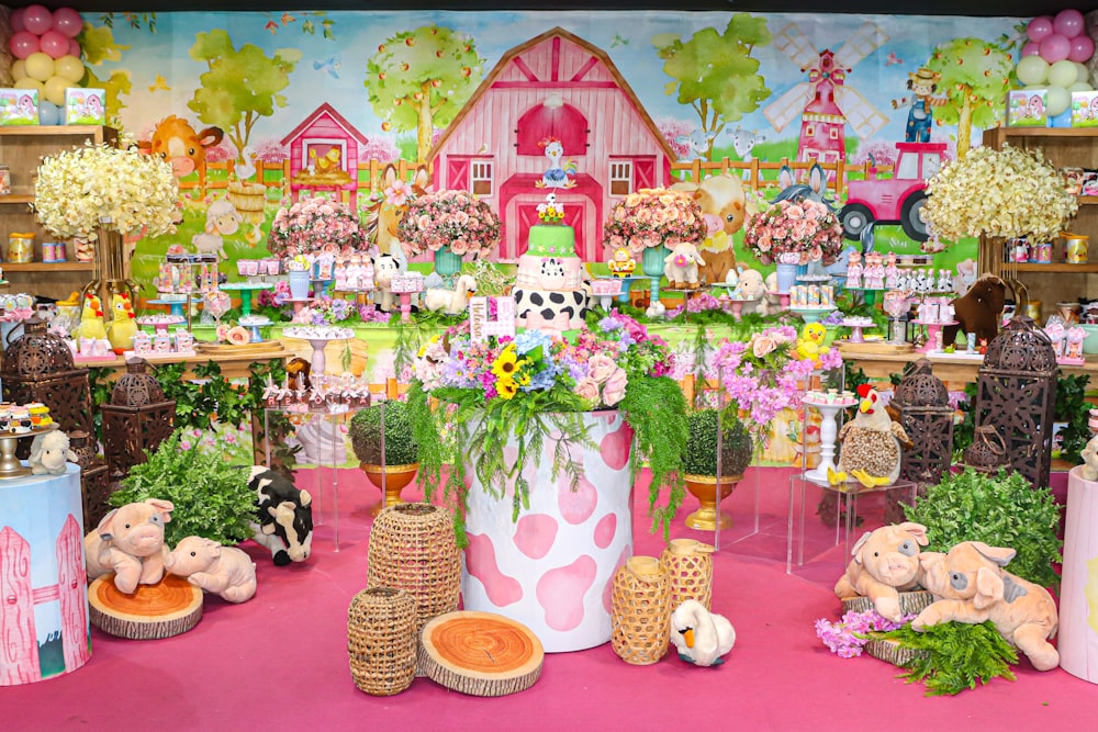 a display of flowers and stuffed animals in a store