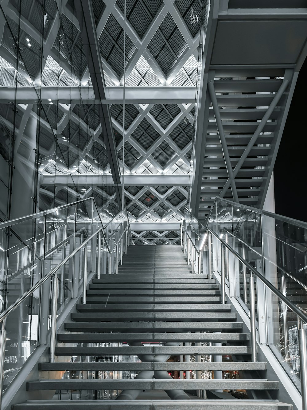 a stair case in a building with metal railings