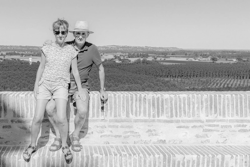 Couple standing on a wall