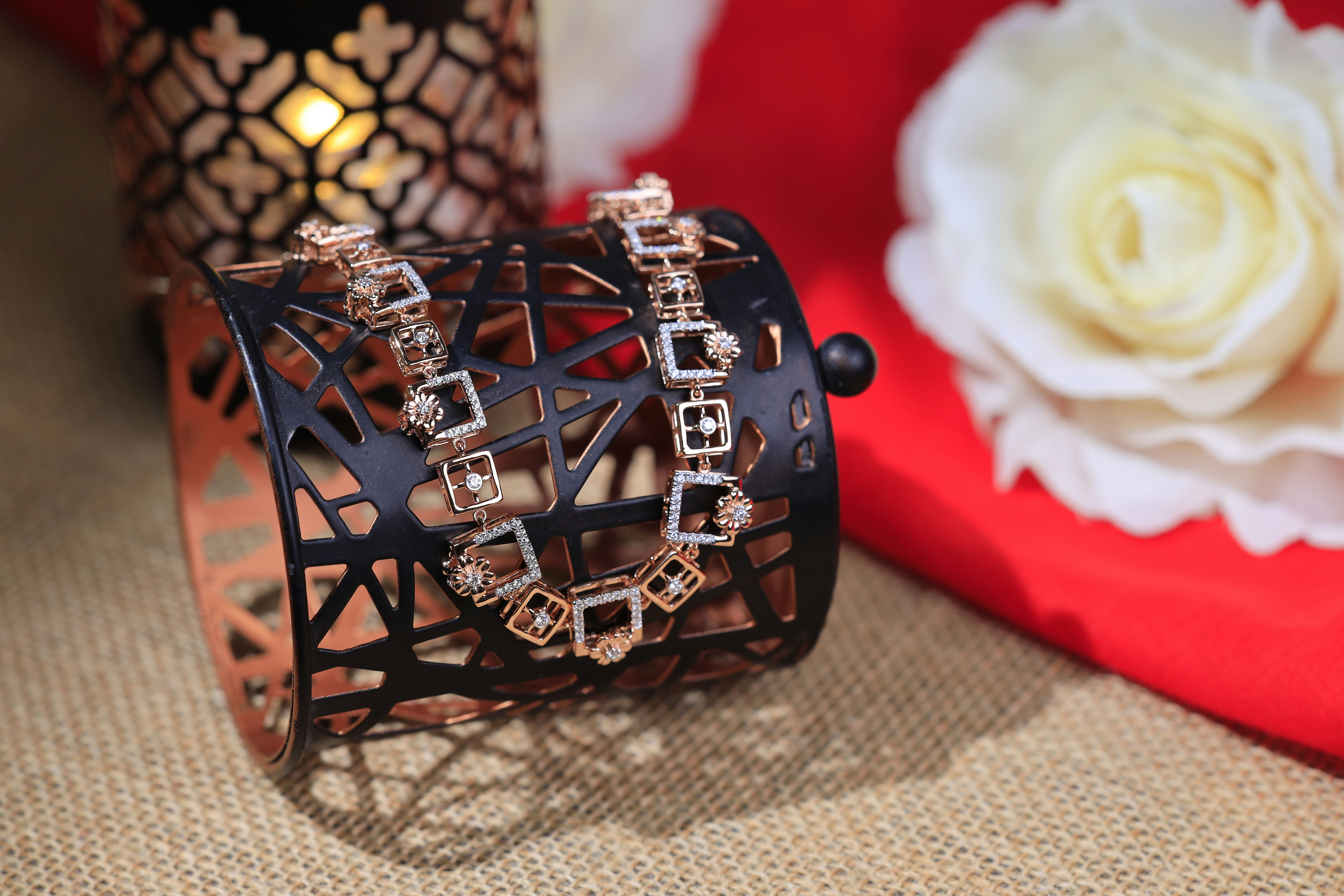 a close up of a bracelet on a table