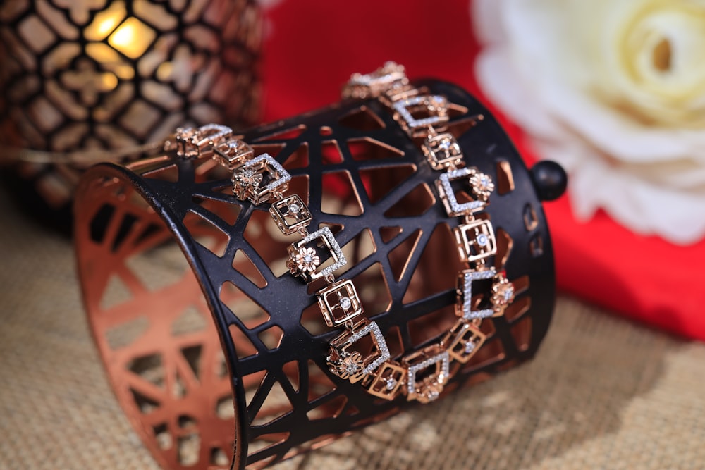 a close up of a bracelet on a table