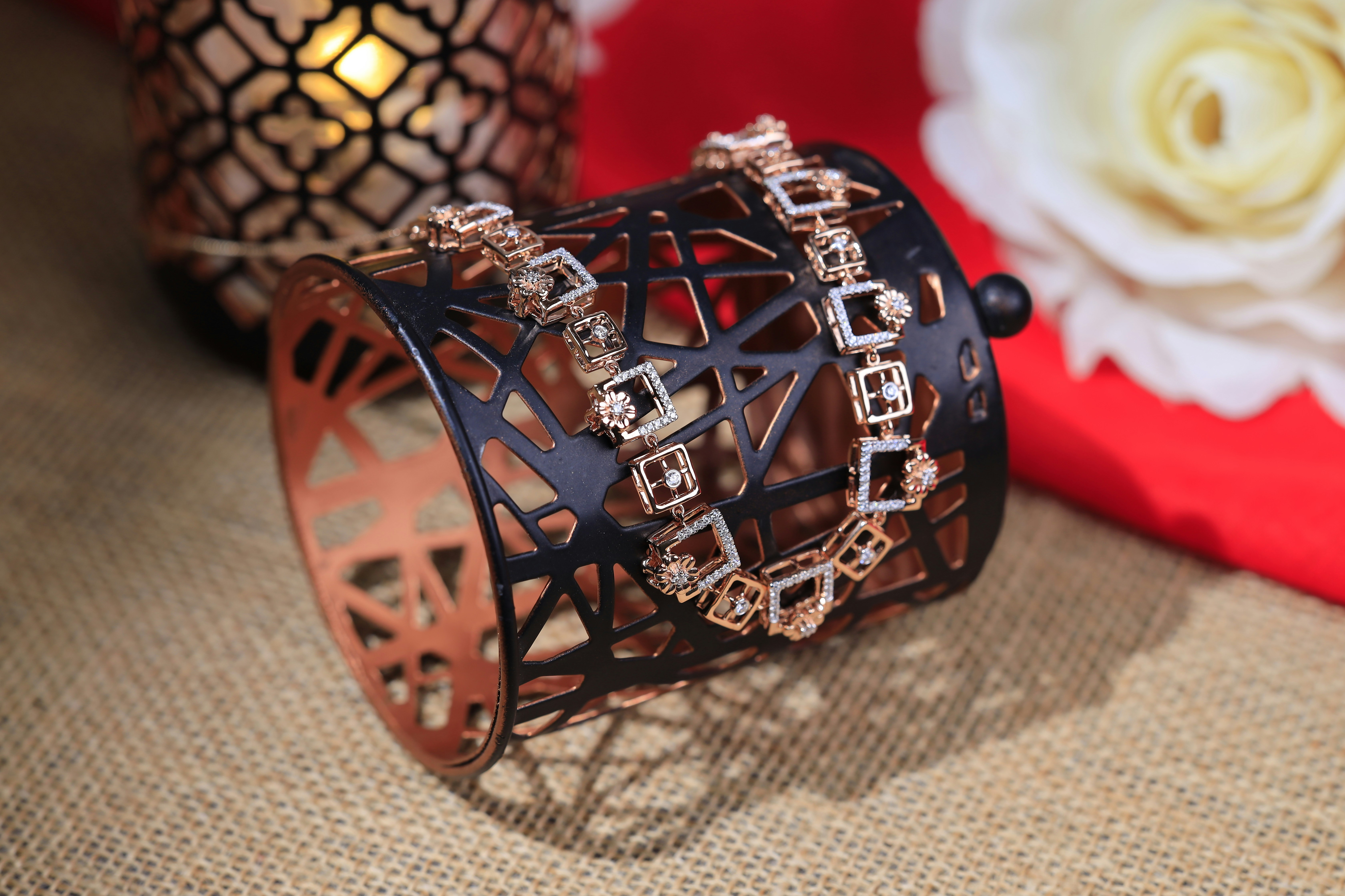 a close up of a bracelet on a table