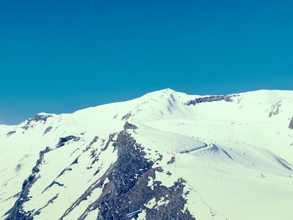 a view of a mountain covered in snow