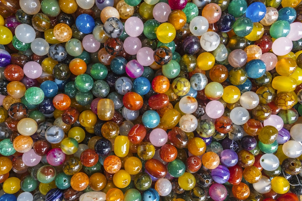 a large amount of marbles are stacked together