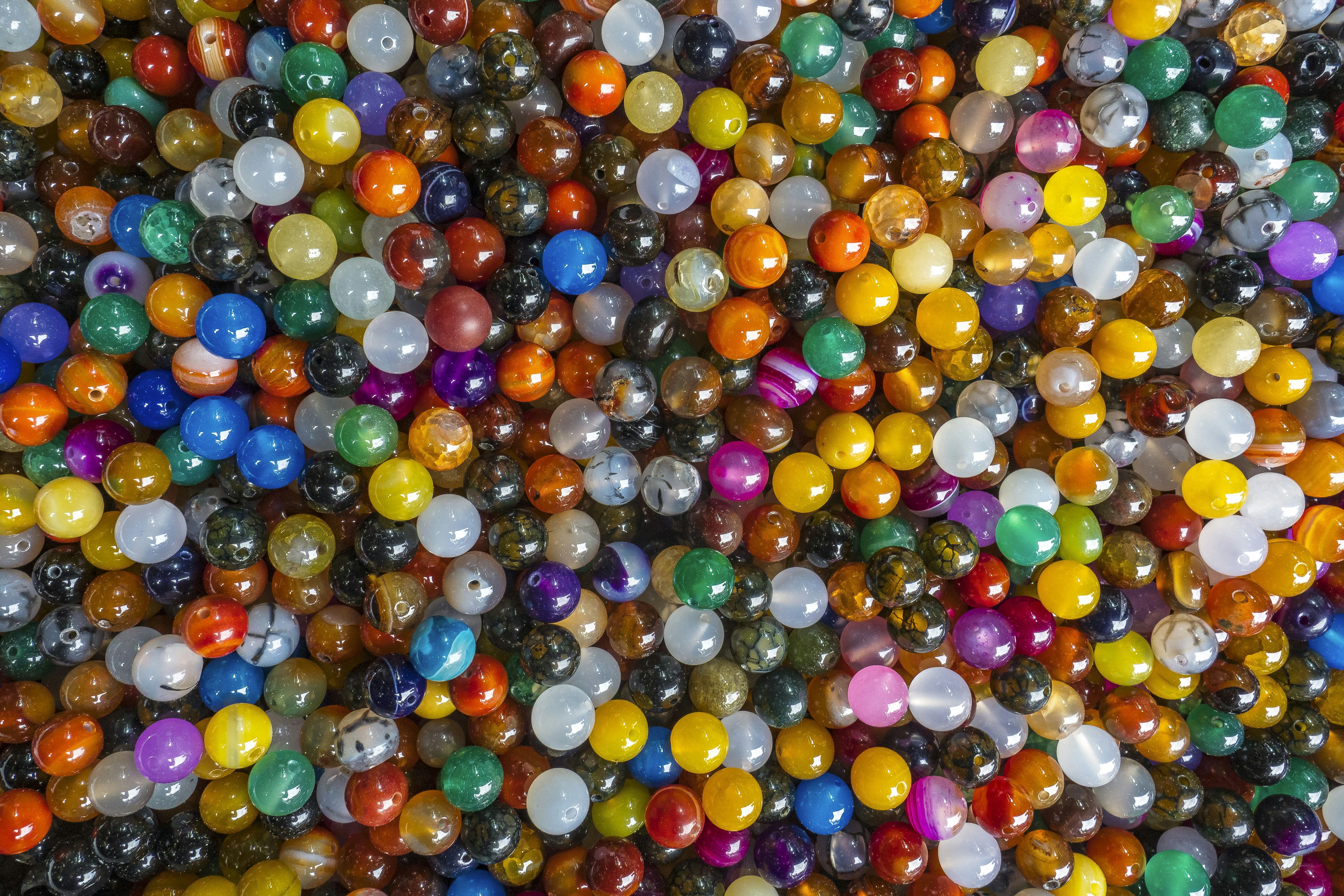 a large amount of different colored balloons