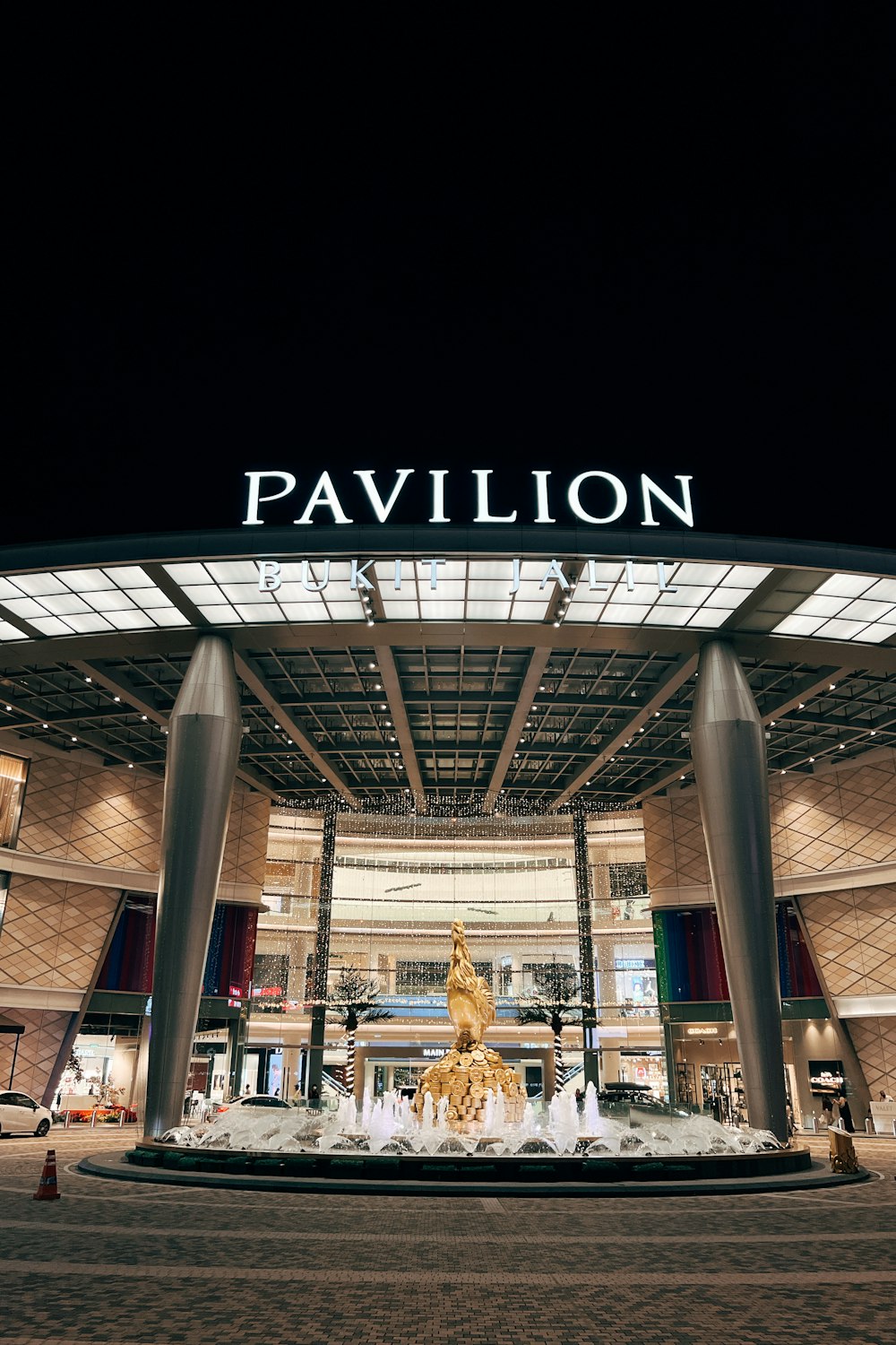 a building with a fountain in front of it