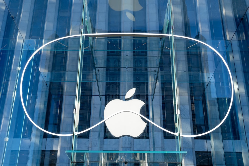 an apple logo on the side of a building