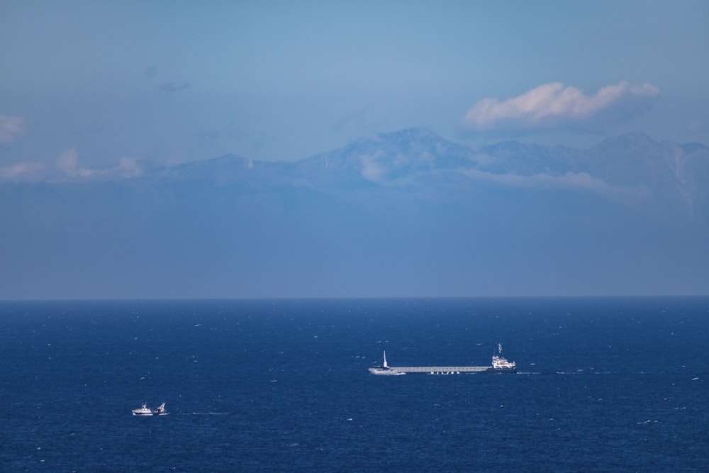 a large boat floating on top of a large body of water